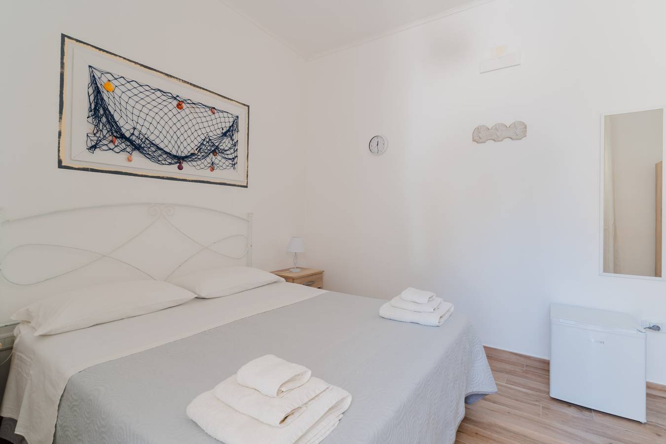 Chambre 'Camera Matrimoniale Con Bagno' avec jardin partagé, Wi-Fi et climatisation in Racale, Golfe de Tarente