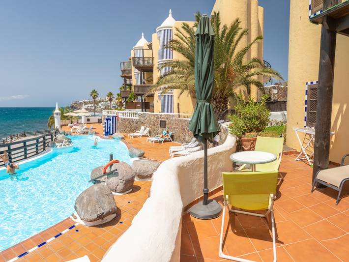 Ferienhaus für 4 Personen, mit Terrasse und Garten sowie Pool in Playa del Águila