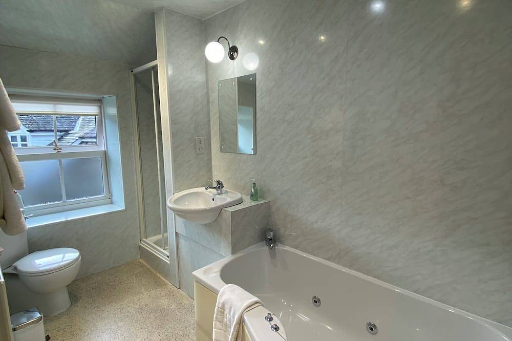 Traditional lakeland cottage refubished without losing old world charm, Car park in Grasmere, Lake District