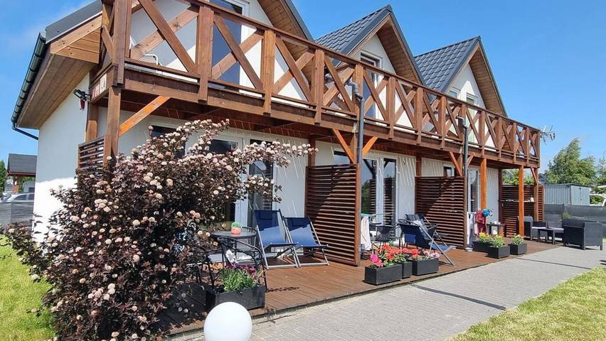 Domek letniskowy dla 6 osób, z widok i ogród w Mielenko