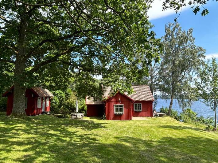 Ferienhaus für 4 Personen, mit Garten und Ausblick sowie Seeblick und Sauna - 1
