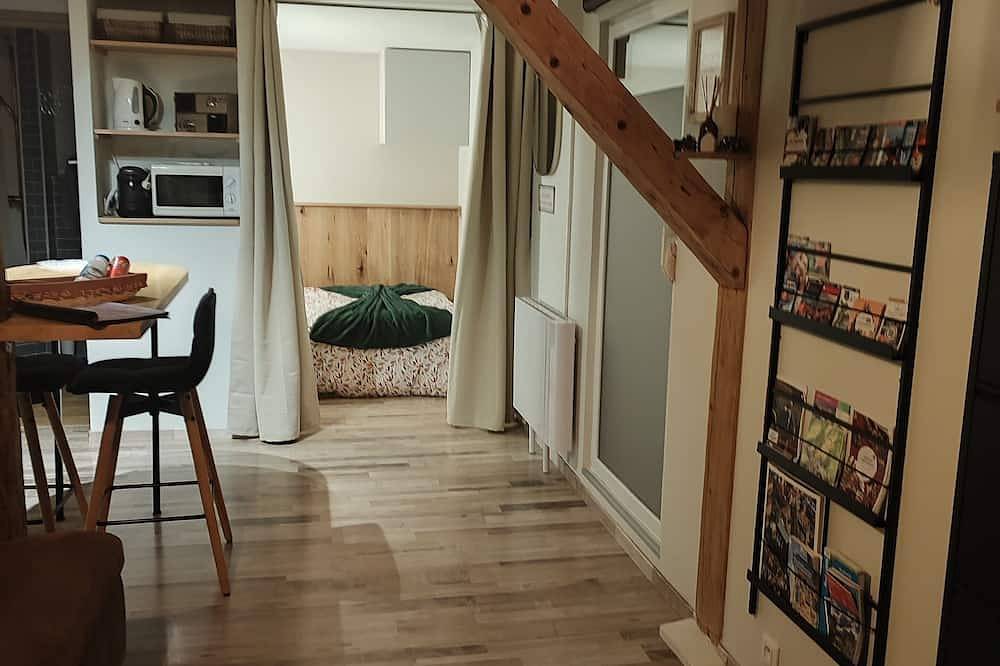 Appartement entier, Petit studio indépendant idéalement situé in Wittelsheim, Région de Thann
