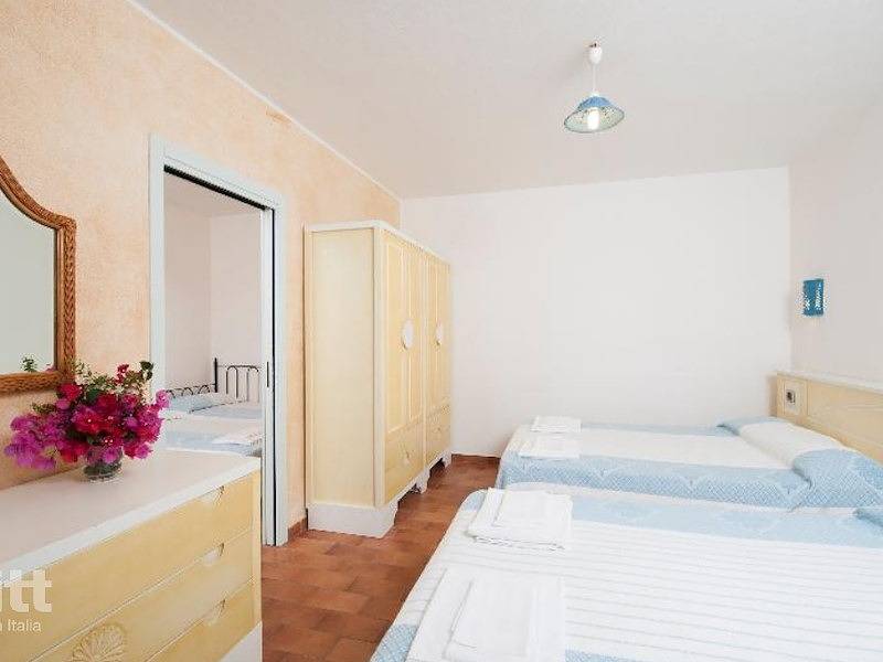 Tritt — In Strandnähe gelegene Ferienwohnung für 6 Personen in einem Ferienpark in Villasimius in Villasimius, Cagliari Provinz