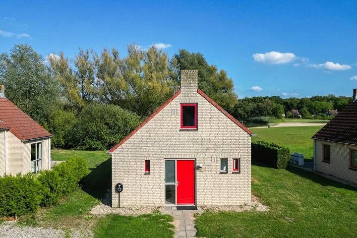 Vakantiepark voor 6 personen, with tuin and uitzicht op het meer as well as terras de Betuwe