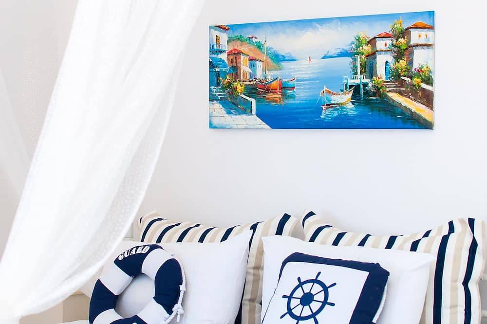 Gezellig en licht appartement, naast het strand in Rethymno (City), Rethymno en omgeving