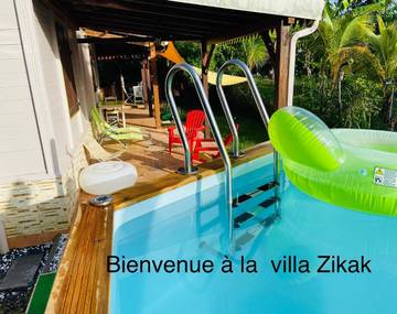Villa pour 4 personnes, avec jardin et piscine ainsi que bassin pour enfant et vue en Martinique