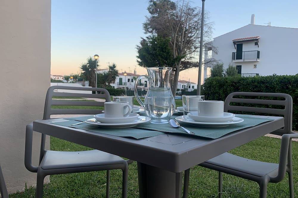 Entire apartment, Ground floor apartment, with garden and direct access to pool. A. A. Free Wifi in Cala Blanes, Ciutadella