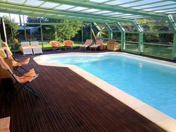 Cottage pour 2 personnes, avec jardin ainsi que terrasse et piscine à Coulaines