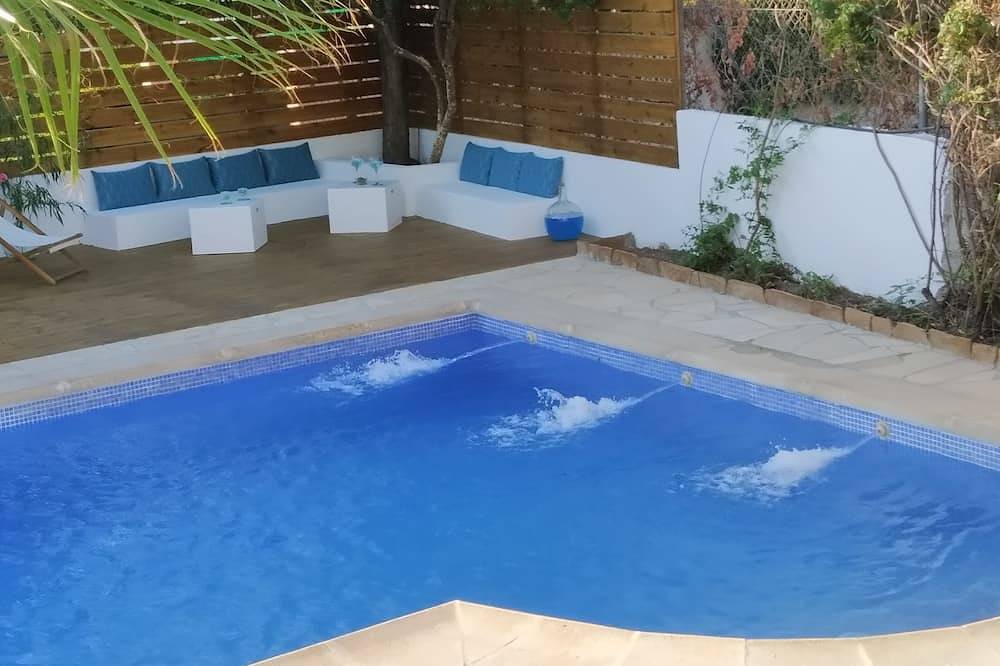 Hébergement rustique, musée de la maison. Piscine et BBQ in Barrio de la Vega, Monachil