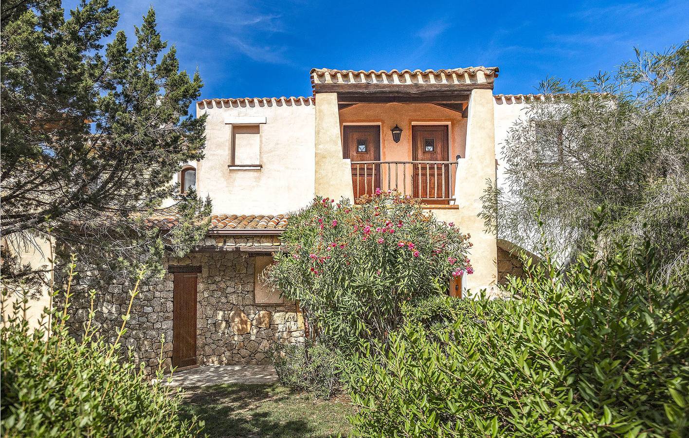 Ganze Ferienwohnung, Sardinien Apartment w/ AC, Parkplatz, Pool & Küche - 2km zum Baja Beach in Liscia di Vacca, Arzachena