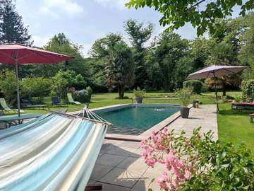 Cottage pour 6 personnes, avec piscine ainsi que bassin pour enfant et jardin à Ogeu-les-Bains