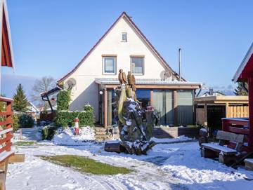 Ferienwohnung für 5 Personen, mit Seeblick und Garten, kinderfreundlich in Freest