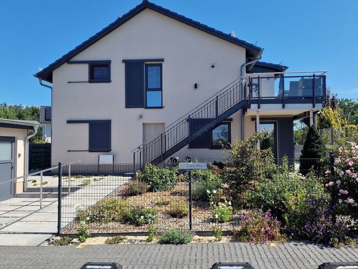 Ferienwohnung für 4 Personen, mit Terrasse und Garten sowie Sauna und Seeblick in Teltow