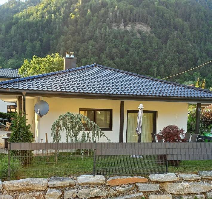 Ferienhaus für 4 Personen, mit Terrasse und Garten sowie Seeblick und Ausblick