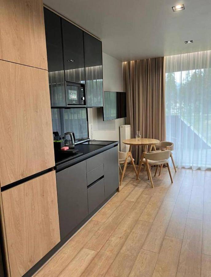 Appartement de vacances pour 2 personnes, avec terrasse et vue ainsi que piscine et sauna
