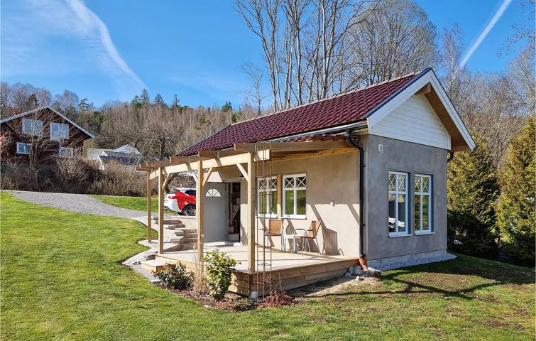 Ferienhaus für 4 Personen, mit Ausblick und Terrasse sowie Garten und Seeblick - 1