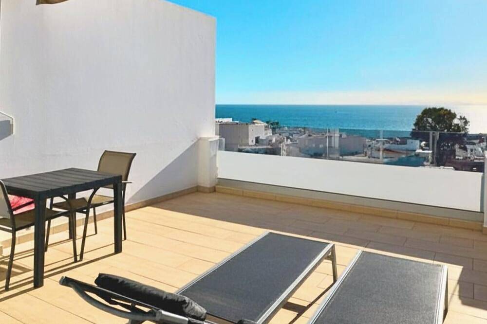 Entire apartment, Zaffiro - Sea view terrace, heated pool in Puerto del Carmen, Tías