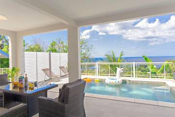 Gîte pour 4 personnes, avec piscine ainsi que balcon et vue à Le Marigot