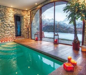 Ferienhaus für 12 Personen, mit Kinderpool und Pool sowie Garten und Ausblick, mit Haustier in den Dolomiten