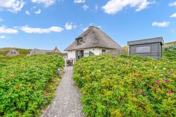 Ferienhaus mit Meerblick für 2 Personen, mit Sauna und Garten sowie Ausblick, mit Haustier in Schleswig-Holstein