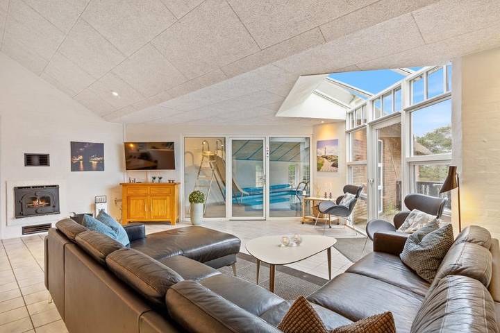 Well-maintained holiday home with pool and sauna for 14 people in Søndervig, Holmsland Klit