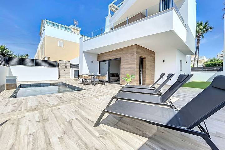 Villa pour 8 personnes, avec jardin et balcon à Guardamar del Segura