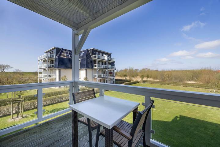 Ferienwohnung für 4 Personen, mit Sauna und Ausblick sowie Balkon in Wremen