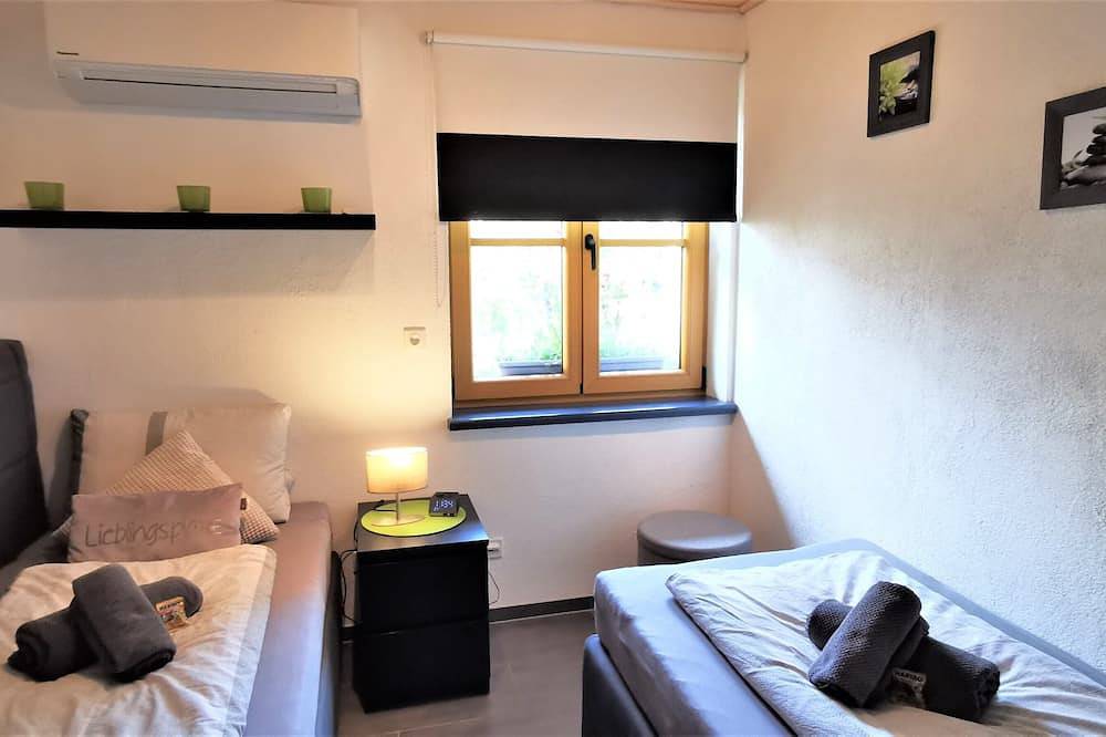 Ganze Wohnung, Moderne Ferienwohnung Strata Montana mit Garten, Fußbodenheizung und Klimaanlage in Bensheim, Bergstraße