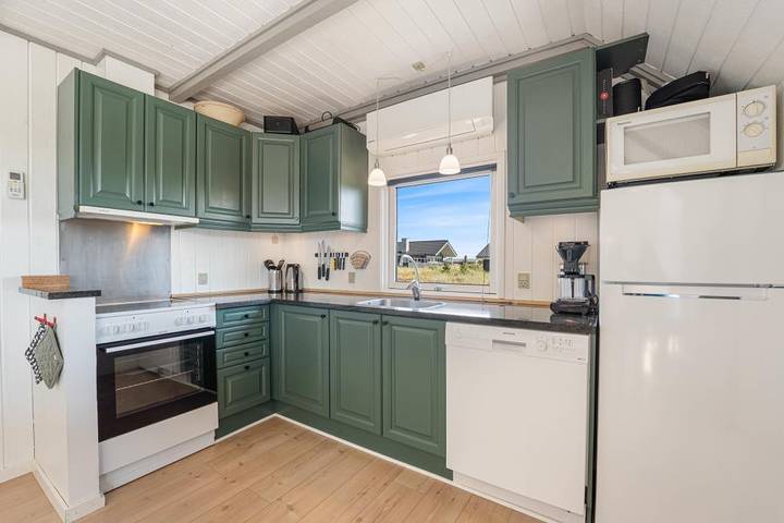 Reetgedecktes Ferienhaus an der dänischen Westküste in Bjerregård, Holmsland Klit