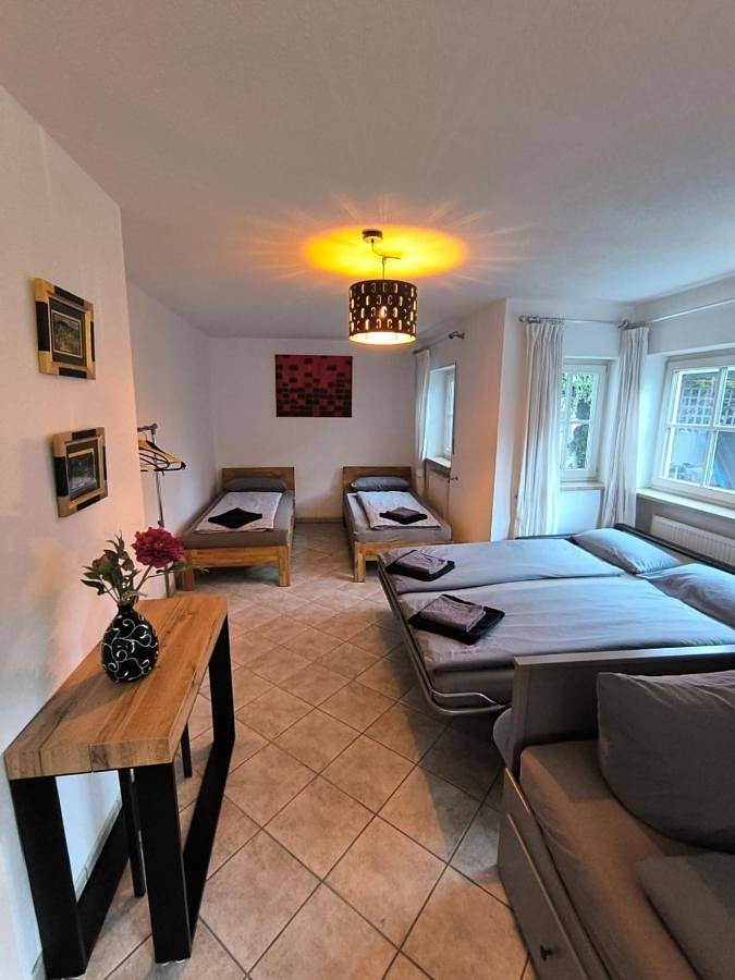 Ferienwohnung für 3 Personen, mit Balkon und Terrasse sowie Garten