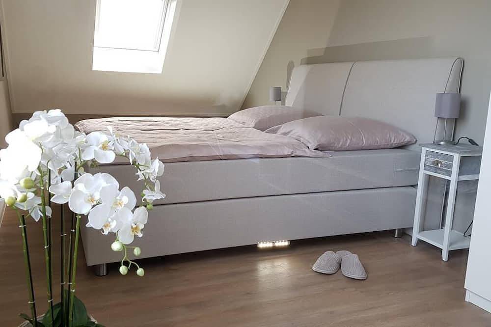 Geheel appartement, Oostend 72 - sfeervolle vakantiewoning dicht bij het strand, huisdieren toegestaan in Nes, Nederlandse waddeneilanden