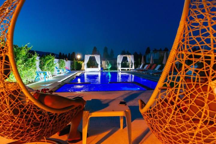 Appartement de vacances pour 6 personnes, avec bassin pour enfant et piscine ainsi que jardin et vue, animaux acceptés