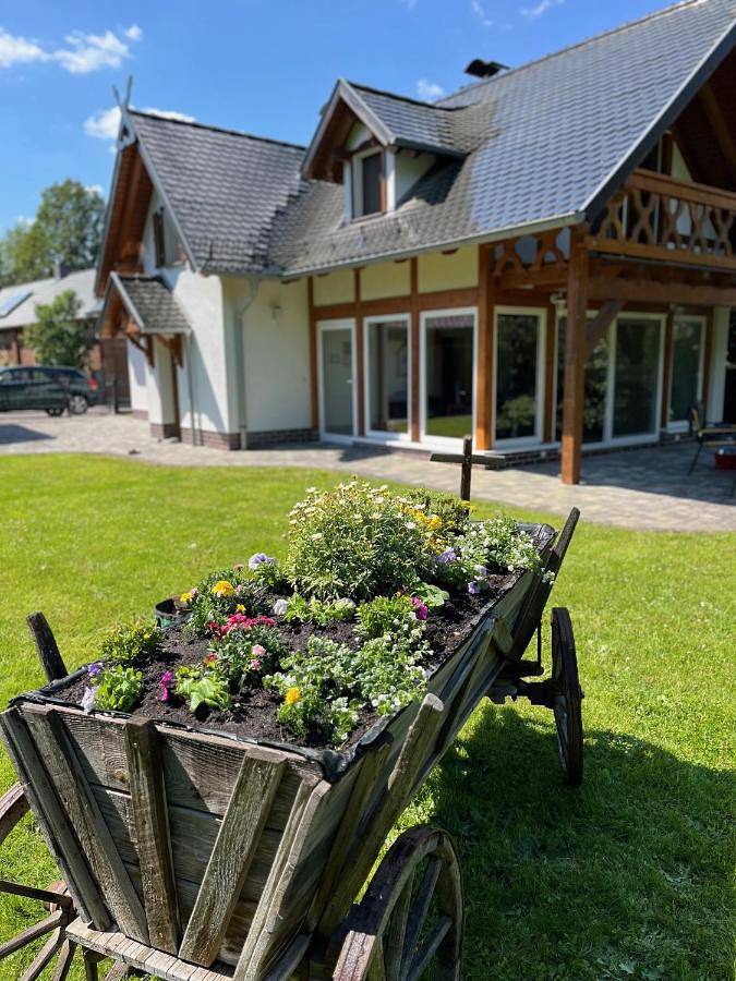 Ferienhaus für 4 Personen, mit Balkon und Terrasse sowie Garten und Sauna