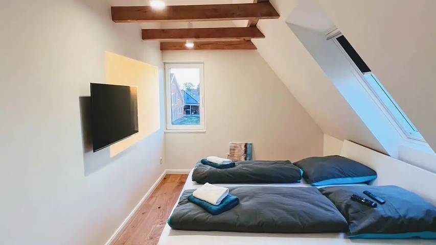 Ferienhaus für 4 Personen, mit Terrasse und Whirlpool sowie Sauna und Garten in Neßmersiel