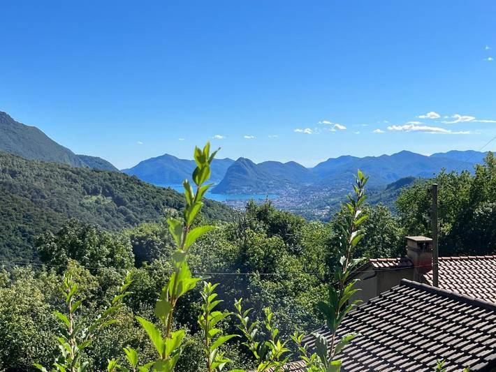 Ferienwohnung für 6 Personen, mit Terrasse und Garten sowie Seeblick und Ausblick