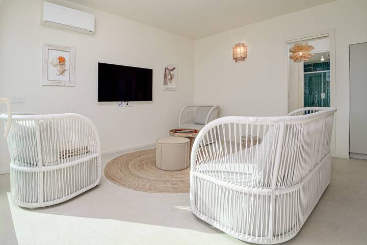 Appartamento intero, Appartamento 'Cala Sole Suite Apartment' con giardino, vista mare, Wi-Fi, aria condizionata in Spiaggia di Baia Caddinas, Golfo Aranci