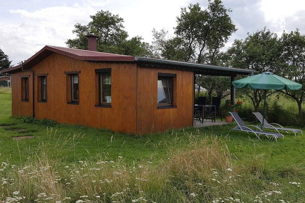 Bungalow nahe Lübbesee mit Terrasse, Kamin und familienfreundlicher Ausstattung in Petersdorf (Milmersdorf), Milmersdorf