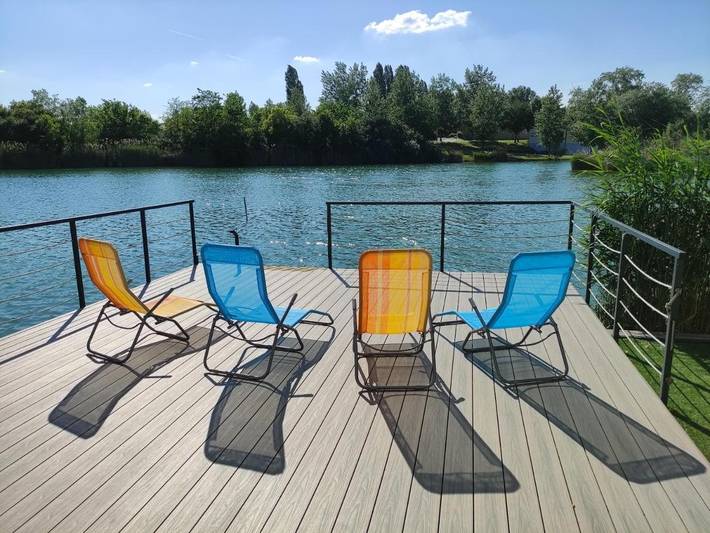 Appartement de vacances pour 4 personnes, avec sauna et vue sur le lac ainsi que vue et jardin