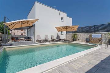 Ferienwohnung für 6 Personen, mit Garten und Pool in Malinska