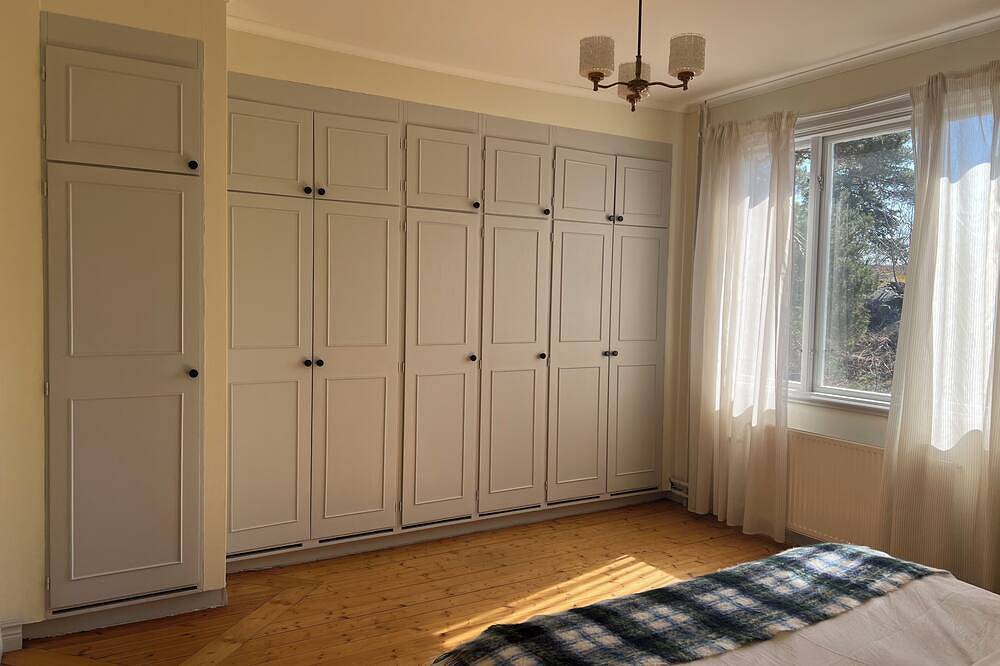 Semi-detached house near the sea, Gotland ferry and archipelago boats in Nynäshamn