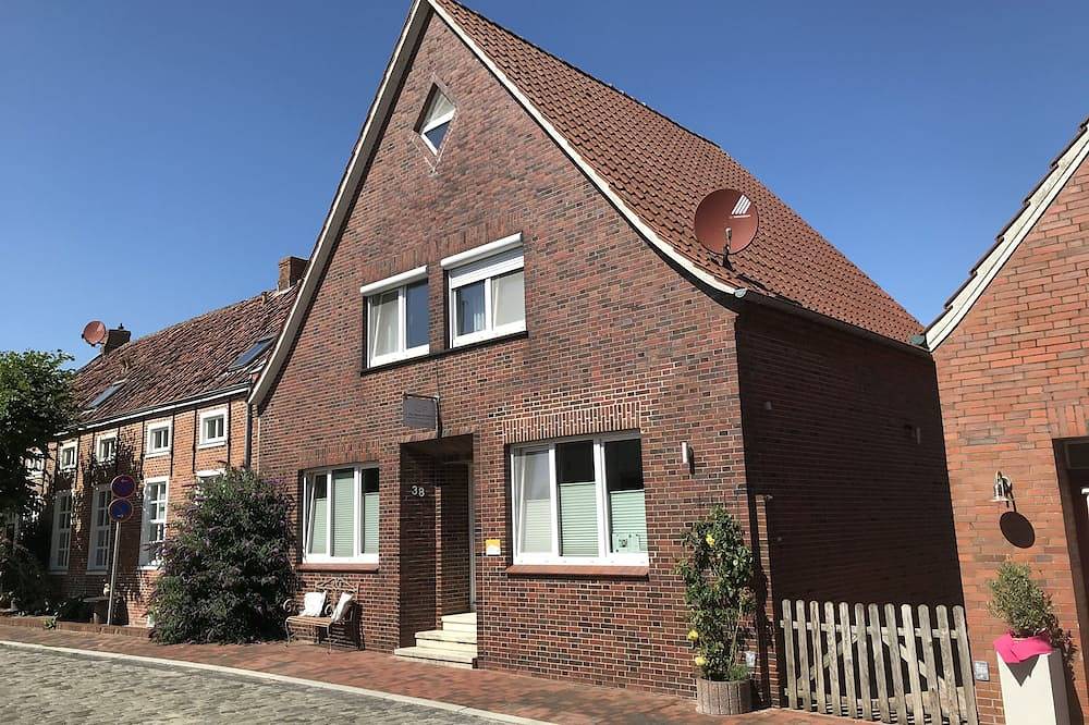 Vier sterren in de haven: modern gerenoveerd vissershuis direct aan de haven Ditzumer in Ditzum, Jemgum