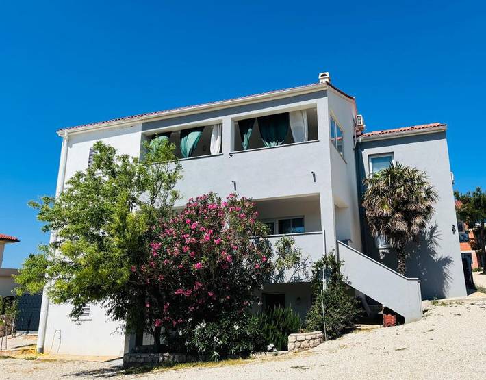 Ferienwohnung für 4 Personen, mit Balkon und Terrasse sowie Garten und Sauna