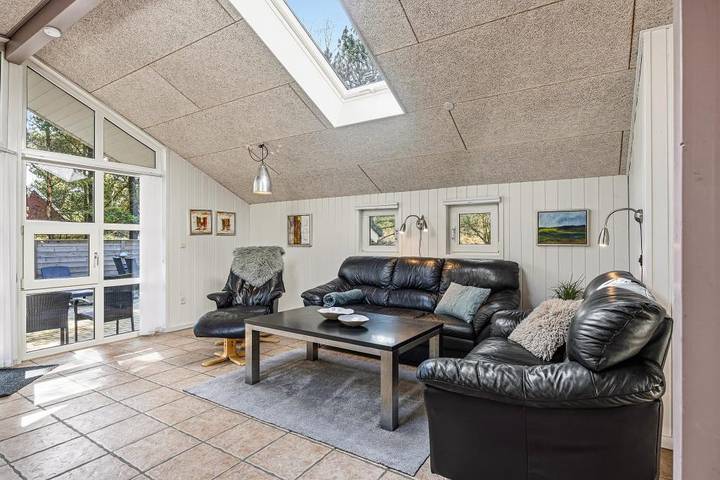 Cosy holiday home with a sauna, an indoor spa and a wood-burning stove on a natural plot in Blåvand in Ho, Varde Region