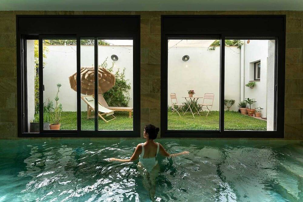 Apartamento entero, Apartamento con piscina climatizada y jardín. in Figueras, Alt Empordà