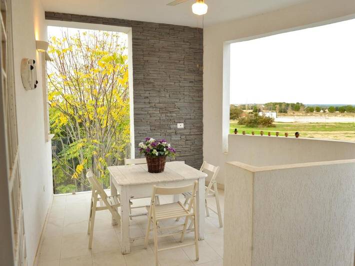 Casa vacanza per 8 persone, con Balcone e Terrazza nonché Giardino e Panorama a Campomarino di Maruggio