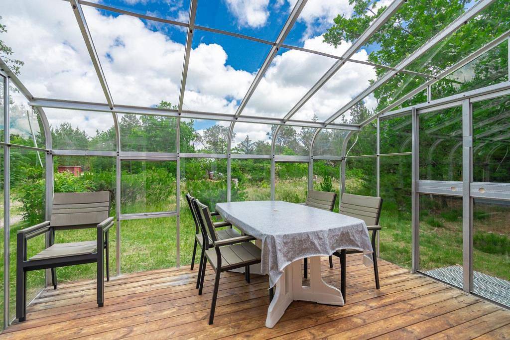 Gemütliches und gepflegtes Ferienhaus mit Wintergarten, Sauna und ruhiger Lage im Grünen in Nørre Nebel, Varde