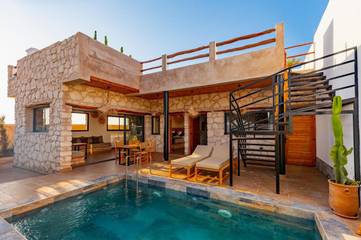 Location de vacances pour 4 personnes, avec terrasse et piscine ainsi que jardin et vue dans Sidi Kaouki