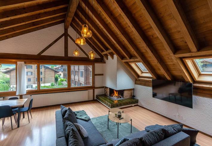 Ferienwohnung für 7 Personen, mit Balkon und Terrasse sowie Garten und Seeblick in Wilderswil