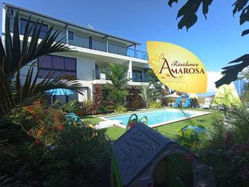 Gîte pour 4 personnes, avec vue ainsi que piscine et jardin aux Avirons