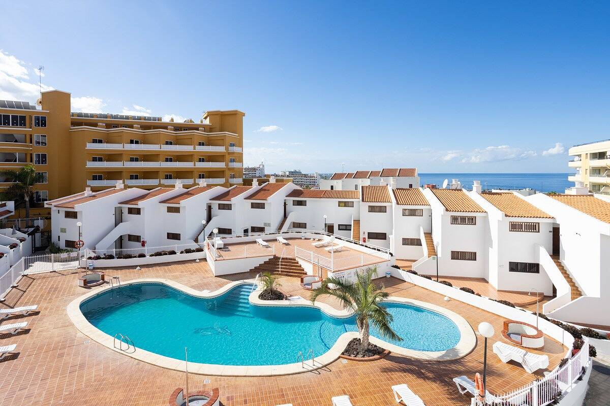 Geheel appartement, Vakantieappartement voor 4 personen met zwembad in Playa Puerto Colón, Adeje